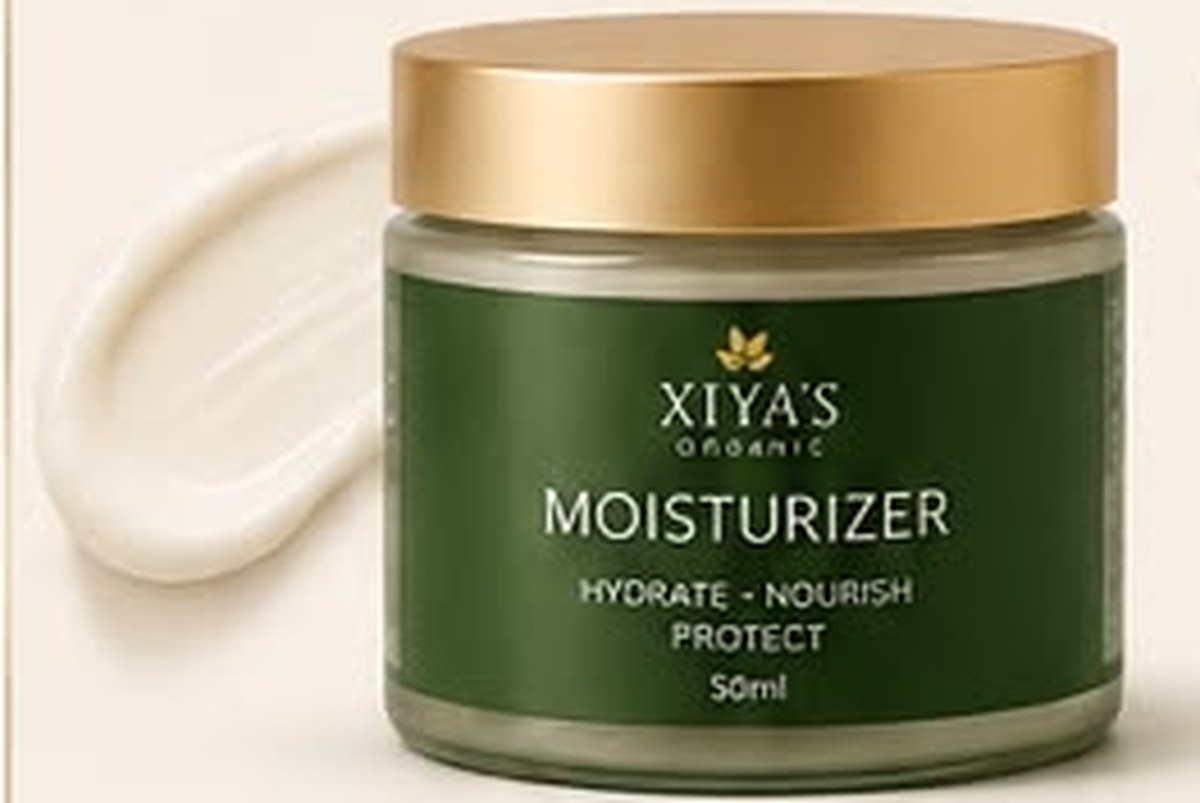Xiya's Organic moisturizer jar beside a swirl of cream